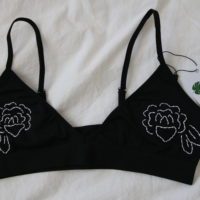 black bralette with hand embroidered white roses