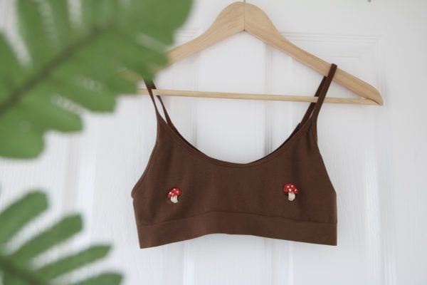 brown bralette with 2 hand embroidered red toadstool mushrooms