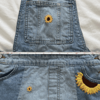 Measurement showing a 26.5 inch waist on the sunflower farm overalls