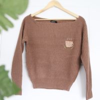 brown jumper hand embroidered with a coffee cup