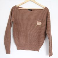 brown jumper hand embroidered with a coffee cup