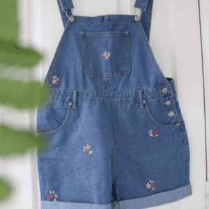 blue denim overall shorts hand embroidered with pink blossom flowers