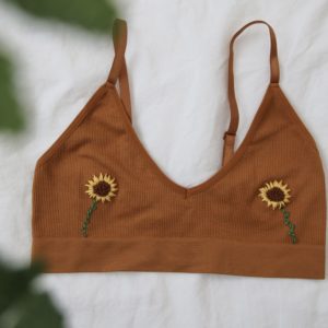 light brown bralette with 2 hand embroidered sunflowers