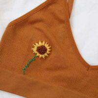 close up of the hand embroidered sunflower