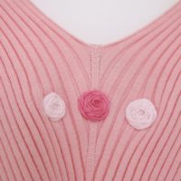 close up of hand embroidered roses