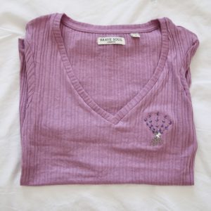 purple top with a v-neck, hand embroidered with a bouquet of lavender
