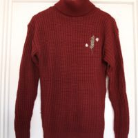 Longline cranberry coloured, turtle-neck jumper hand embroidered with rosemary and daisies