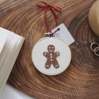 3 inch Christmas tree decoration. hand embroidered with a gingerbread man