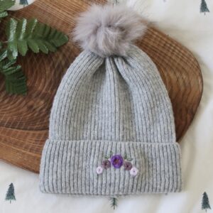 Grey pom pom beanie hand embroidered with purple roses