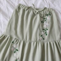 embroidered maxi skirt with green vines and daisies