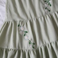 sage green maxi skirt hand embroidered with vines and daisies