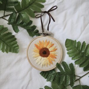 3 inch decoration hand embroidered with a sunflower