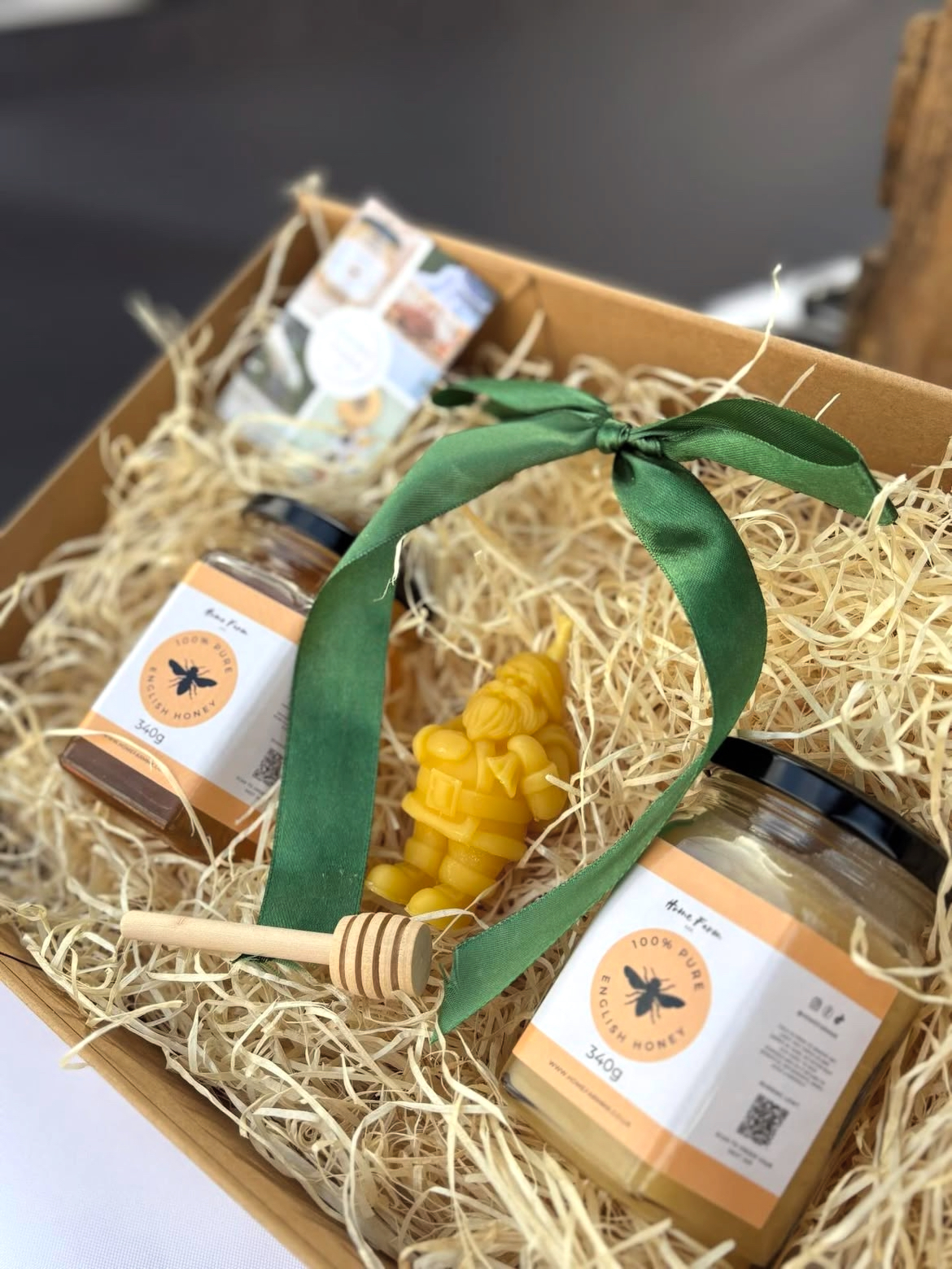 A gift box with homemade honey and beeswax candle