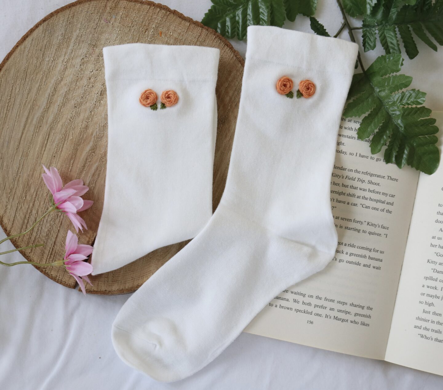 White cotton socks hand embroidered with pink roses