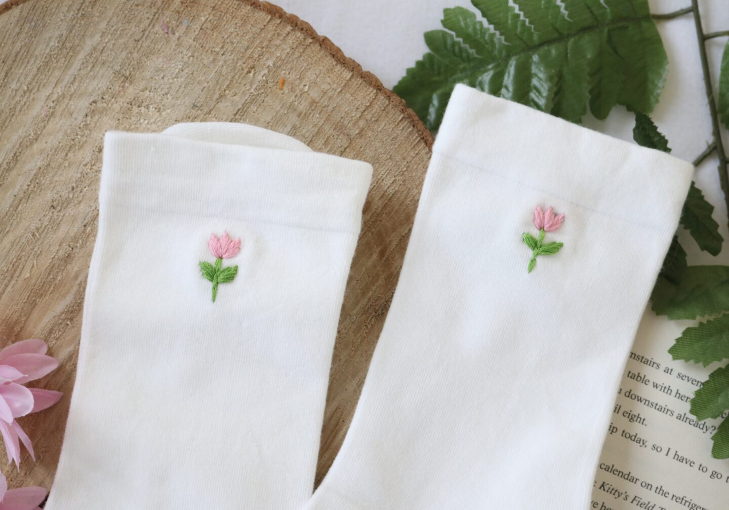 Soft pink tulips hand embroidered on white cotton socks
