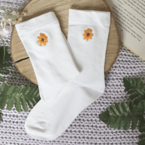 Hand embroidered sunflowers on white cotton socks