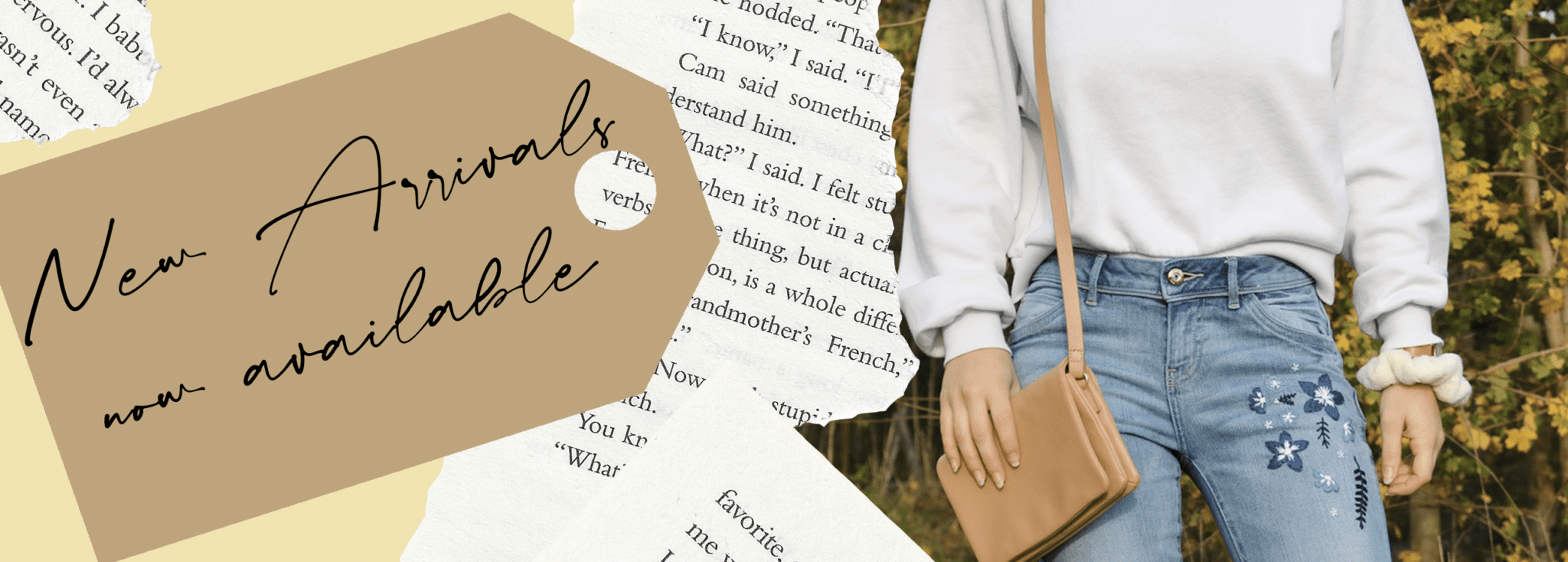 homepage banner with an image of hand embroidered blue jeans with flowers and a tag that says 'new arrivals now available'